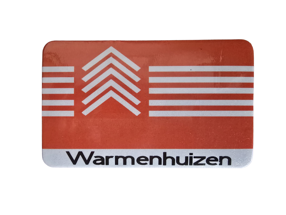 Koelkast magneet met de vlag van Warmenhuizen en de plaatsnaam eronder